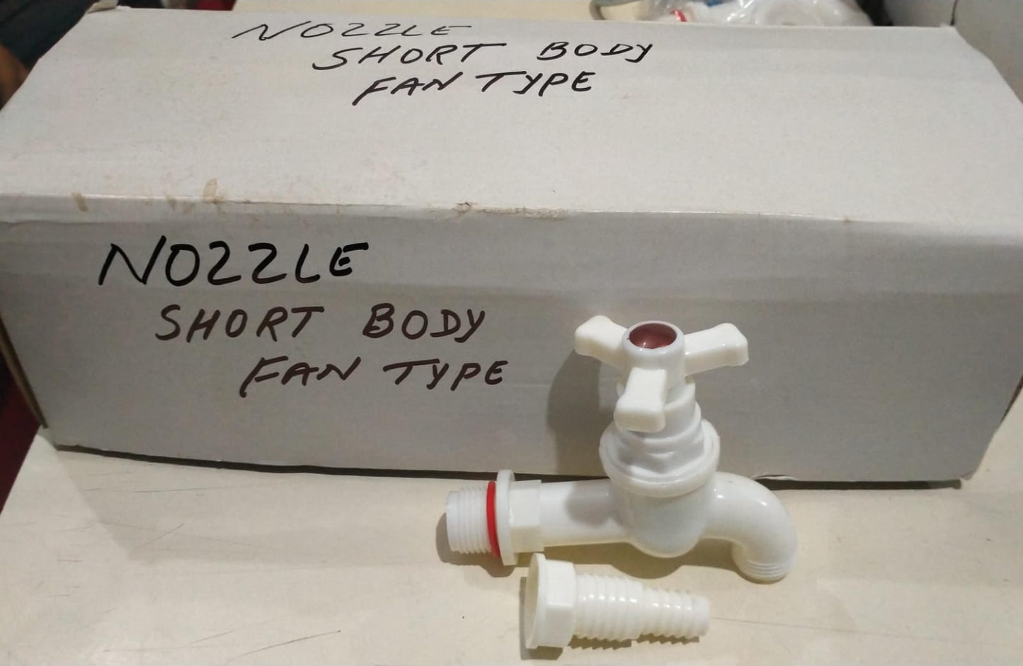 Nozzle short body fan type nal tap